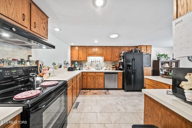 What a gem! Enjoy beautiful lake views and easy access for on Druid Hills Golf Club in Tennessee - for sale on GolfHomes.com, golf home, golf lot