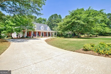 Welcome to your new home in Arbor Springs.  This custom built on Coweta Club in Georgia - for sale on GolfHomes.com, golf home, golf lot