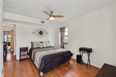 Rarely available 1st floor corner unit with serene lake views on Aberdeen Golf and Country Club in Florida - for sale on GolfHomes.com, golf home, golf lot