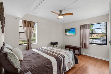 Rarely available 1st floor corner unit with serene lake views on Aberdeen Golf and Country Club in Florida - for sale on GolfHomes.com, golf home, golf lot