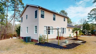 A charming two-story home nestled in the desirable Quail Ridge on Quail Ridge Golf Course in North Carolina - for sale on GolfHomes.com, golf home, golf lot