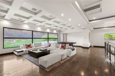 Tucked behind the gates of MacDonald Highlands, this exquisite on Dragon Ridge Country Club in Nevada - for sale on GolfHomes.com, golf home, golf lot