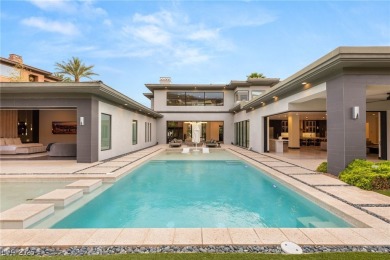 Tucked behind the gates of MacDonald Highlands, this exquisite on Dragon Ridge Country Club in Nevada - for sale on GolfHomes.com, golf home, golf lot