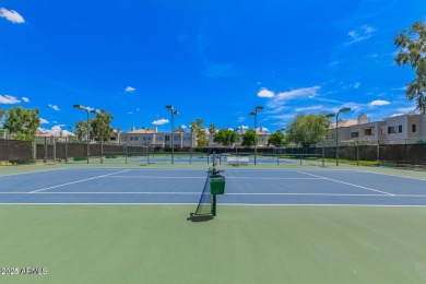 This fully furnished, turnkey 3-bedroom, 2-bath townhouse has on Gainey Ranch Golf Club in Arizona - for sale on GolfHomes.com, golf home, golf lot