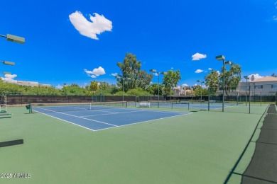 This fully furnished, turnkey 3-bedroom, 2-bath townhouse has on Gainey Ranch Golf Club in Arizona - for sale on GolfHomes.com, golf home, golf lot