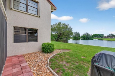 Rarely available 1st floor corner unit with serene lake views on Aberdeen Golf and Country Club in Florida - for sale on GolfHomes.com, golf home, golf lot