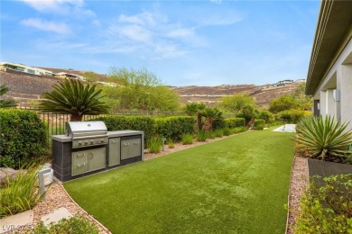Tucked behind the gates of MacDonald Highlands, this exquisite on Dragon Ridge Country Club in Nevada - for sale on GolfHomes.com, golf home, golf lot