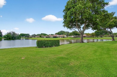 Rarely available 1st floor corner unit with serene lake views on Aberdeen Golf and Country Club in Florida - for sale on GolfHomes.com, golf home, golf lot