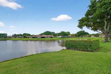 Rarely available 1st floor corner unit with serene lake views on Aberdeen Golf and Country Club in Florida - for sale on GolfHomes.com, golf home, golf lot