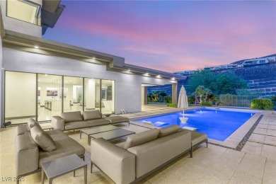 Tucked behind the gates of MacDonald Highlands, this exquisite on Dragon Ridge Country Club in Nevada - for sale on GolfHomes.com, golf home, golf lot
