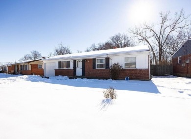 Well maintained brick ranch full of potential, fully fenced in on Meadow Links and Golf Academy in Ohio - for sale on GolfHomes.com, golf home, golf lot