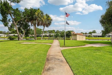 Welcome to Fairgreen VI, a sought-after golf and lakefront on Hidden Lakes Golf Club in Florida - for sale on GolfHomes.com, golf home, golf lot