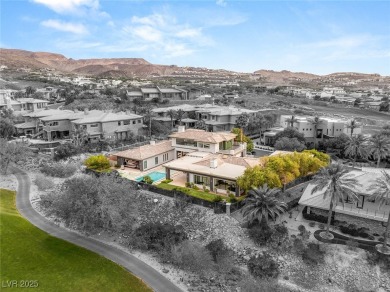 Tucked behind the gates of MacDonald Highlands, this exquisite on Dragon Ridge Country Club in Nevada - for sale on GolfHomes.com, golf home, golf lot