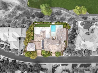 Tucked behind the gates of MacDonald Highlands, this exquisite on Dragon Ridge Country Club in Nevada - for sale on GolfHomes.com, golf home, golf lot