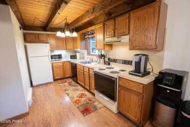 Welcome to this contemporary Pocono retreat located in the on The Hideout Golf in Pennsylvania - for sale on GolfHomes.com, golf home, golf lot