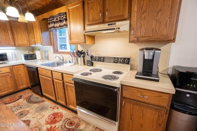 Welcome to this contemporary Pocono retreat located in the on The Hideout Golf in Pennsylvania - for sale on GolfHomes.com, golf home, golf lot