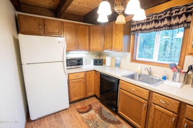 Welcome to this contemporary Pocono retreat located in the on The Hideout Golf in Pennsylvania - for sale on GolfHomes.com, golf home, golf lot