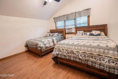Welcome to this contemporary Pocono retreat located in the on The Hideout Golf in Pennsylvania - for sale on GolfHomes.com, golf home, golf lot