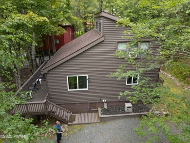 Welcome to this contemporary Pocono retreat located in the on The Hideout Golf in Pennsylvania - for sale on GolfHomes.com, golf home, golf lot