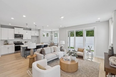 Welcome to the Mae Farmhouse -- a 4-bedroom, 3.5-bath home with on Tidewater Golf Club and Plantation in South Carolina - for sale on GolfHomes.com, golf home, golf lot