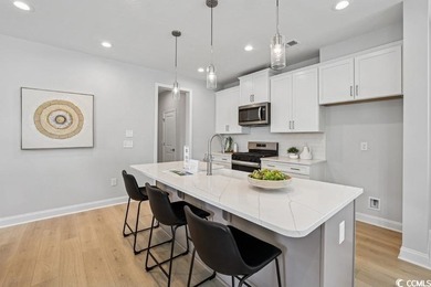 Welcome to the Mae Farmhouse -- a 4-bedroom, 3.5-bath home with on Tidewater Golf Club and Plantation in South Carolina - for sale on GolfHomes.com, golf home, golf lot