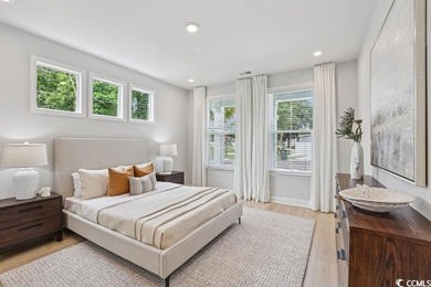 Welcome to the Mae Farmhouse -- a 4-bedroom, 3.5-bath home with on Tidewater Golf Club and Plantation in South Carolina - for sale on GolfHomes.com, golf home, golf lot