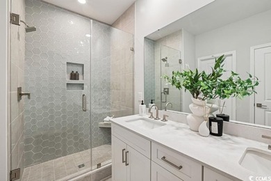 Welcome to the Mae Farmhouse -- a 4-bedroom, 3.5-bath home with on Tidewater Golf Club and Plantation in South Carolina - for sale on GolfHomes.com, golf home, golf lot