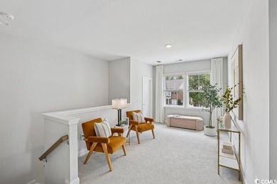 Welcome to the Mae Farmhouse -- a 4-bedroom, 3.5-bath home with on Tidewater Golf Club and Plantation in South Carolina - for sale on GolfHomes.com, golf home, golf lot