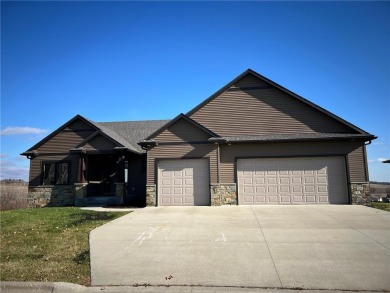 Stunning 4-bedroom, 3-bathroom luxury home situated on a serene on Zumbrota Golf Club in Minnesota - for sale on GolfHomes.com, golf home, golf lot