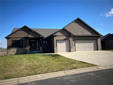 Stunning 4-bedroom, 3-bathroom luxury home situated on a serene on Zumbrota Golf Club in Minnesota - for sale on GolfHomes.com, golf home, golf lot