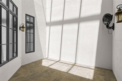 Discover luxury living in this exquisite two-story condominium on Winter Park Country Club in Florida - for sale on GolfHomes.com, golf home, golf lot