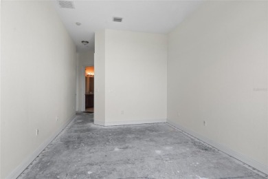Discover luxury living in this exquisite two-story condominium on Winter Park Country Club in Florida - for sale on GolfHomes.com, golf home, golf lot
