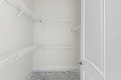 Discover luxury living in this exquisite two-story condominium on Winter Park Country Club in Florida - for sale on GolfHomes.com, golf home, golf lot