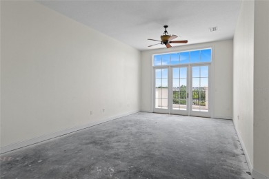 Discover luxury living in this exquisite two-story condominium on Winter Park Country Club in Florida - for sale on GolfHomes.com, golf home, golf lot