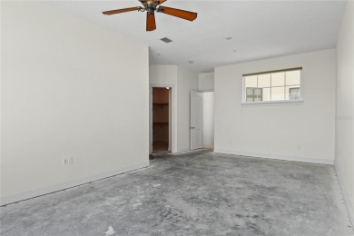 Discover luxury living in this exquisite two-story condominium on Winter Park Country Club in Florida - for sale on GolfHomes.com, golf home, golf lot