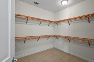 Discover luxury living in this exquisite two-story condominium on Winter Park Country Club in Florida - for sale on GolfHomes.com, golf home, golf lot