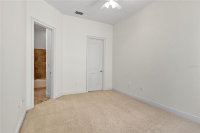 Discover luxury living in this exquisite two-story condominium on Winter Park Country Club in Florida - for sale on GolfHomes.com, golf home, golf lot
