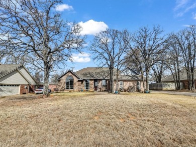 A relaxing Country Club lifestyle is waiting for you! This on Pecan Plantation Country Club in Texas - for sale on GolfHomes.com, golf home, golf lot