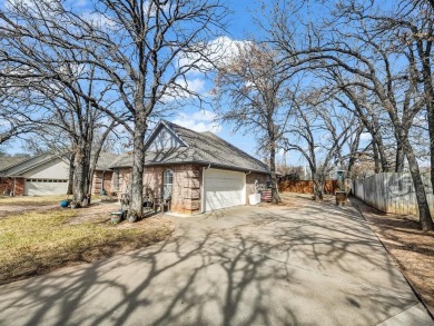 A relaxing Country Club lifestyle is waiting for you! This on Pecan Plantation Country Club in Texas - for sale on GolfHomes.com, golf home, golf lot