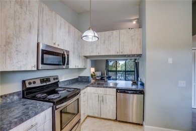 COMPLETELY RENOVATED... UPDATED KITCHEN  BATHROOMS, NEW WINDOWS on Pelican Pointe 9 Hole Course in Florida - for sale on GolfHomes.com, golf home, golf lot