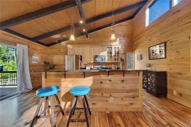 Welcome to 455 Tamarack Drive, a light-filled mountain retreat on Bent Tree Golf Course in Georgia - for sale on GolfHomes.com, golf home, golf lot