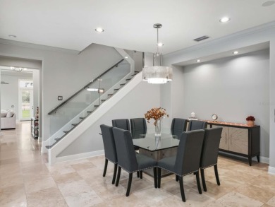 This private, tucked-away residence is perfectly located on the on Lake Nona Golf Club, Inc. in Florida - for sale on GolfHomes.com, golf home, golf lot