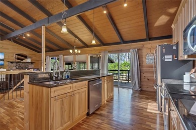 Welcome to 455 Tamarack Drive, a light-filled mountain retreat on Bent Tree Golf Course in Georgia - for sale on GolfHomes.com, golf home, golf lot