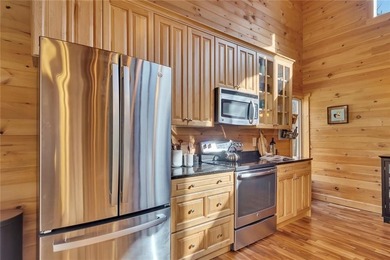 Welcome to 455 Tamarack Drive, a light-filled mountain retreat on Bent Tree Golf Course in Georgia - for sale on GolfHomes.com, golf home, golf lot