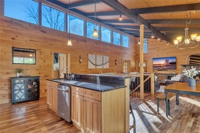 Welcome to 455 Tamarack Drive, a light-filled mountain retreat on Bent Tree Golf Course in Georgia - for sale on GolfHomes.com, golf home, golf lot