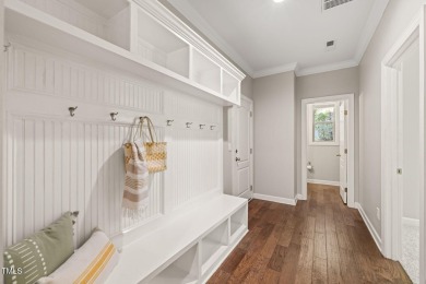 Welcome to 1046 Covered Bridge Trail - a spacious and elegant on The Preserve At Jordan Lake Golf Club in North Carolina - for sale on GolfHomes.com, golf home, golf lot
