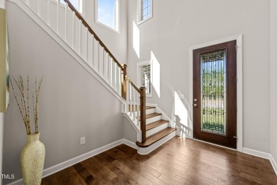 Welcome to 1046 Covered Bridge Trail - a spacious and elegant on The Preserve At Jordan Lake Golf Club in North Carolina - for sale on GolfHomes.com, golf home, golf lot