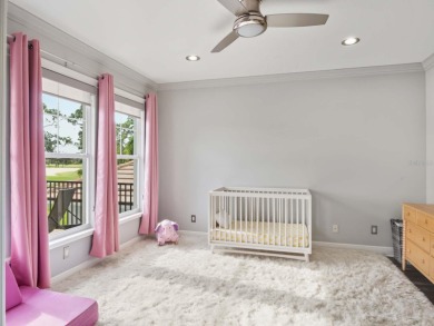 This private, tucked-away residence is perfectly located on the on Lake Nona Golf Club, Inc. in Florida - for sale on GolfHomes.com, golf home, golf lot