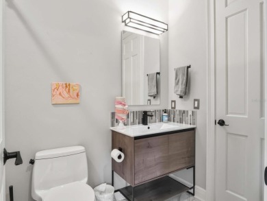 This private, tucked-away residence is perfectly located on the on Lake Nona Golf Club, Inc. in Florida - for sale on GolfHomes.com, golf home, golf lot