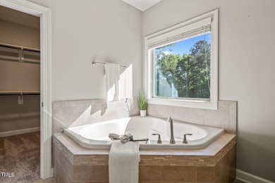 Welcome to 1046 Covered Bridge Trail - a spacious and elegant on The Preserve At Jordan Lake Golf Club in North Carolina - for sale on GolfHomes.com, golf home, golf lot